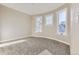 Bright bedroom features three windows and carpeted floors at 2631 W 34Th Ave, Denver, CO 80211