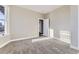 Sun-drenched bedroom featuring plush carpeting, base-molding and a neutral paint color at 2631 W 34Th Ave, Denver, CO 80211