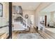 Welcoming foyer with hardwood floors, elegant staircase, and charming entryway features at 2631 W 34Th Ave, Denver, CO 80211