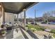 Relaxing front porch features cozy seating and a charming view of the neighborhood street at 2631 W 34Th Ave, Denver, CO 80211