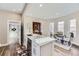 Bright, updated kitchen with marble countertops, stainless steel appliances, and an open connection to the dining room at 2631 W 34Th Ave, Denver, CO 80211
