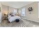 Serene main bedroom features cozy accents, natural light, and carpeted flooring at 2631 W 34Th Ave, Denver, CO 80211