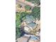 Overhead view of a home featuring a green roof, adjacent to other residential structures at 8820 Poze Blvd, Thornton, CO 80229