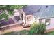 A tranquil house aerial view shows a garden patch and green rooftop at 8820 Poze Blvd, Thornton, CO 80229