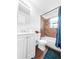 Bright bathroom with a shower-tub combo, updated vanity, and stylish fixtures at 8820 Poze Blvd, Thornton, CO 80229