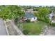 Charming home boasts a spacious yard, mature trees, and a well-maintained exterior at 8820 Poze Blvd, Thornton, CO 80229