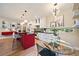 Contemporary kitchen featuring a center island, modern appliances, and an open dining area at 2461 Spruce St, Denver, CO 80238