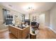 Bright living room featuring modern decor, a fireplace, and hardwood flooring at 2461 Spruce St, Denver, CO 80238