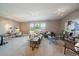 Spacious living room with neutral walls, large windows, and stylish decor; perfect blend of comfort and elegance at 2461 Spruce St, Denver, CO 80238