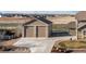 View of detached oversized two car garage at 11343 E 163Rd Ct, Brighton, CO 80602