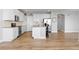 Spacious kitchen with stainless steel appliances and a center island with seating at 11343 E 163Rd Ct, Brighton, CO 80602