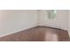 Bedroom featuring wood-look flooring, neutral paint and natural light at 6455 E Bates Ave # 4-105, Denver, CO 80222