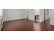 Bedroom featuring wood-look flooring, large windows and light, neutral paint at 6455 E Bates Ave # 4-105, Denver, CO 80222
