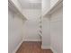 Walk-in closet featuring built-in shelves, and ample storage space at 6455 E Bates Ave # 4-105, Denver, CO 80222