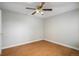 Cozy bedroom featuring hardwood floors and a ceiling fan at 5214 S Tibet St, Aurora, CO 80015