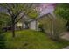 Charming single-Gathering home featuring a well-maintained lawn and mature trees in a peaceful neighborhood at 5214 S Tibet St, Aurora, CO 80015