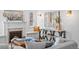 Inviting living room features a fireplace, built-in benches, and stylish decor, creating a cozy and elegant ambiance at 1615 Kearney St, Denver, CO 80220