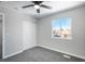 Spacious bedroom with double closet and ceiling fan at 4575 Gibraltar St, Denver, CO 80249