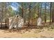Two sheds nestled in the backyard of this home, offering ample storage space at 34103 Forest Park Dr, Elizabeth, CO 80107