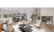 Bright, open-concept living area with wood floors, modern staircase, and fireplace; perfect for entertaining at 9575 Garland Ct, Westminster, CO 80021