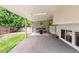 Covered outdoor patio with ample seating, providing a cozy space for relaxation and entertainment with backyard views at 3612 Rosewalk Cir, Highlands Ranch, CO 80129
