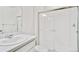 Clean, bright bathroom featuring a glass shower enclosure, sink with vanity, and toilet at 18120 Dandy Brush Ln, Parker, CO 80134