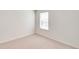Bedroom features neutral carpet, and a single window at 18120 Dandy Brush Ln, Parker, CO 80134