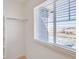 Walk-in closet features wire shelving and a window with bright natural light at 18120 Dandy Brush Ln, Parker, CO 80134