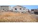 Backyard with sloped lot and partial view at 4715 River Highlands Loop, Elizabeth, CO 80107