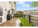 Patio and fenced backyard area with a grill at 12973 Grant E Cir # A, Thornton, CO 80241