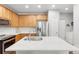 Bright kitchen features stainless steel appliances, marble countertops, and an undermount sink at 12973 Grant E Cir # A, Thornton, CO 80241