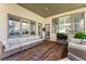 Back porch with comfortable seating and large windows that let in natural light at 3104 Ramshorn Dr, Castle Rock, CO 80108