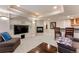 Finished basement with a cozy fireplace and stylish seating area at 3104 Ramshorn Dr, Castle Rock, CO 80108
