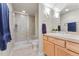Well-maintained bathroom with glass-enclosed shower and modern vanity at 3104 Ramshorn Dr, Castle Rock, CO 80108