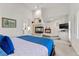 Serene main bedroom with fireplace, sitting area, and neutral color palette at 3104 Ramshorn Dr, Castle Rock, CO 80108