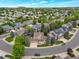 Aerial view showcases homes surrounded by mature landscaping in neighborhood at 2359 Indian Paintbrush Cir, Highlands Ranch, CO 80129