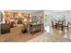 Spacious living room offers a fireplace, built-in shelving, and multiple seating arrangements at 2359 Indian Paintbrush Cir, Highlands Ranch, CO 80129