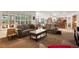 Large living room with neutral tones, open floorplan, and lots of natural light at 2359 Indian Paintbrush Cir, Highlands Ranch, CO 80129