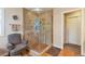 Modern shower with glass enclosure, tile surround and a sitting chair at 2359 Indian Paintbrush Cir, Highlands Ranch, CO 80129