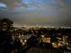 Enjoy city skyline views from this home overlooking the vibrant cityscape at twilight at 130 N Pearl St # 1001, Denver, CO 80203