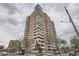 Tall high-rise building featuring multiple balconies and street views at 130 N Pearl St # 1001, Denver, CO 80203