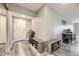 Inviting foyer featuring hardwood floors and ample storage at 130 N Pearl St # 1001, Denver, CO 80203
