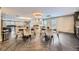 Elegant gathering room featuring a modern lighting, fireplace and cozy seating creating a perfect spot for socializing and relaxation at 130 N Pearl St # 1001, Denver, CO 80203