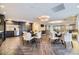 Open living and dining space with modern lighting and kitchen creating a communal area perfect for entertaining and gathering at 130 N Pearl St # 1001, Denver, CO 80203