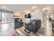 Modern living room with sleek fireplace and comfortable seating at 130 N Pearl St # 1001, Denver, CO 80203