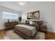 Serene bedroom with a platform bed, modern decor, and ample natural light at 828 Mariposa St, Denver, CO 80204