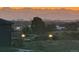 Enjoy a breathtaking sunset view overlooking the city, with the Rocky Mountains in the distance at 6805 Zebra Grass Ln, Parker, CO 80138