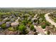 A picturesque neighborhood featuring mature trees, well-maintained homes, and a convenient location at 9174 Lark Sparrow Pl, Highlands Ranch, CO 80126