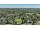 Extensive aerial view of a neighborhood with tree-lined streets and a green grassy park at 291 W Sycamore Ln, Louisville, CO 80027