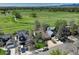 Aerial view of property showing the house, backyard, landscaping, and surrounding neighborhood at 291 W Sycamore Ln, Louisville, CO 80027